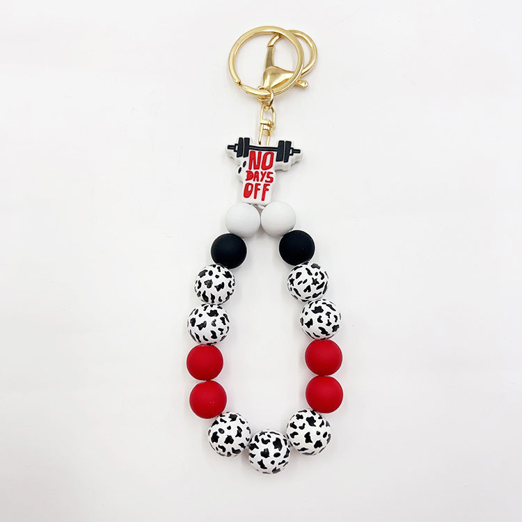Wholesale Silicone Pumpkin Cow Ghost Dog Paw Wooden Bead Bracelet Keychain